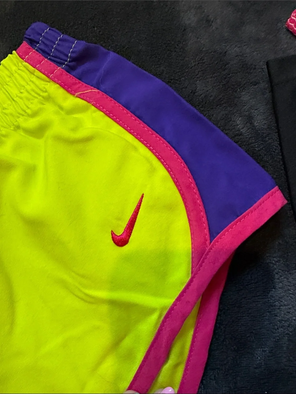 Nike Kid’s Neon Yellow Running Shorts with Pink Trim and Purple Accents